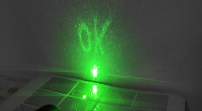 hidden-text-hologram-sticker,-the-word-of-OK-can-be-observed-by-laser-pen