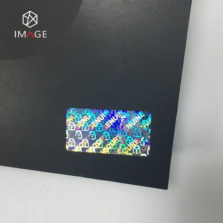 hologram sticker with genuine secure in the background, affixed to packaging box