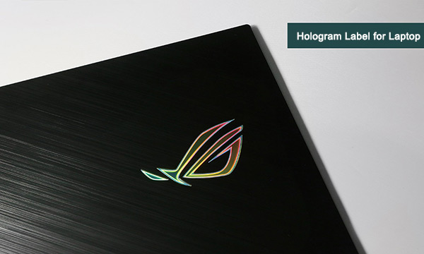 holographic laptop label with metal texture